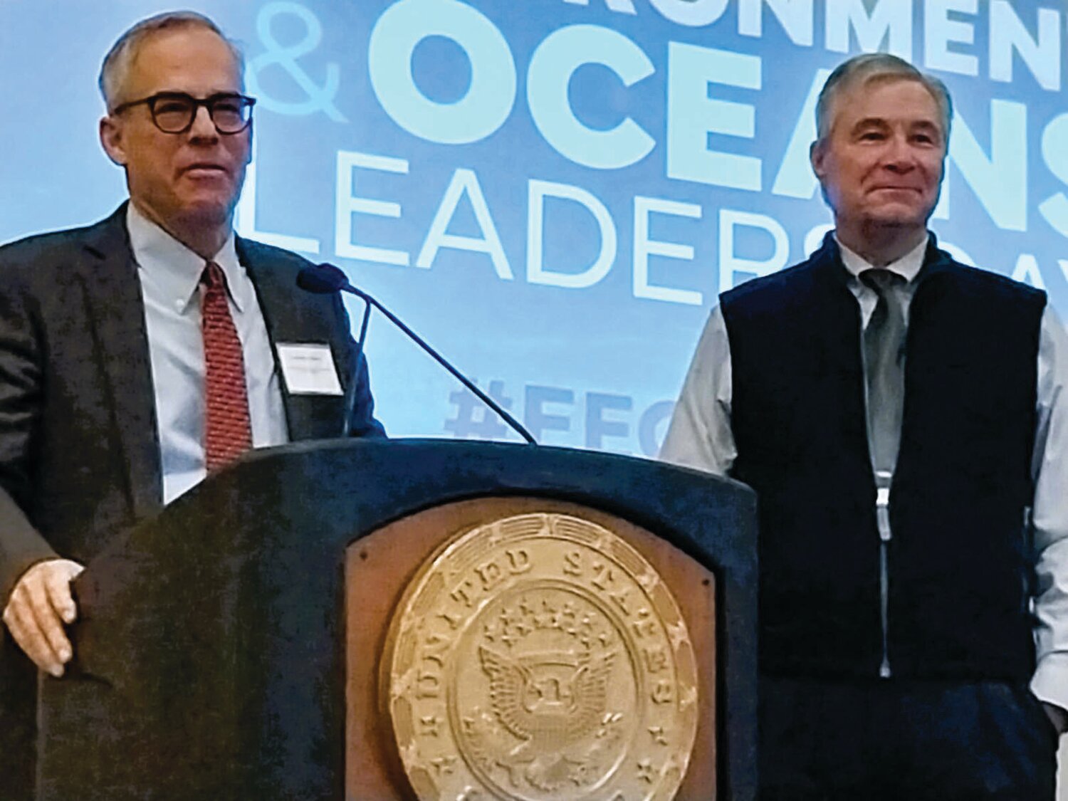 PERSON OF THE YEAR: Jonathan Stone, former Executive Director of Save the Bay, was presented this year’s person of the year award  by Senator Sheldon Whitehouse at the 14th Annual Energy, Environment and Oceans Leaders Day.